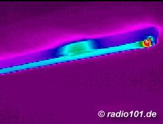 Fluorescent lamp (warm ends an warm hot ignition coil are visible), infra red image (Wrmebild, thermography)